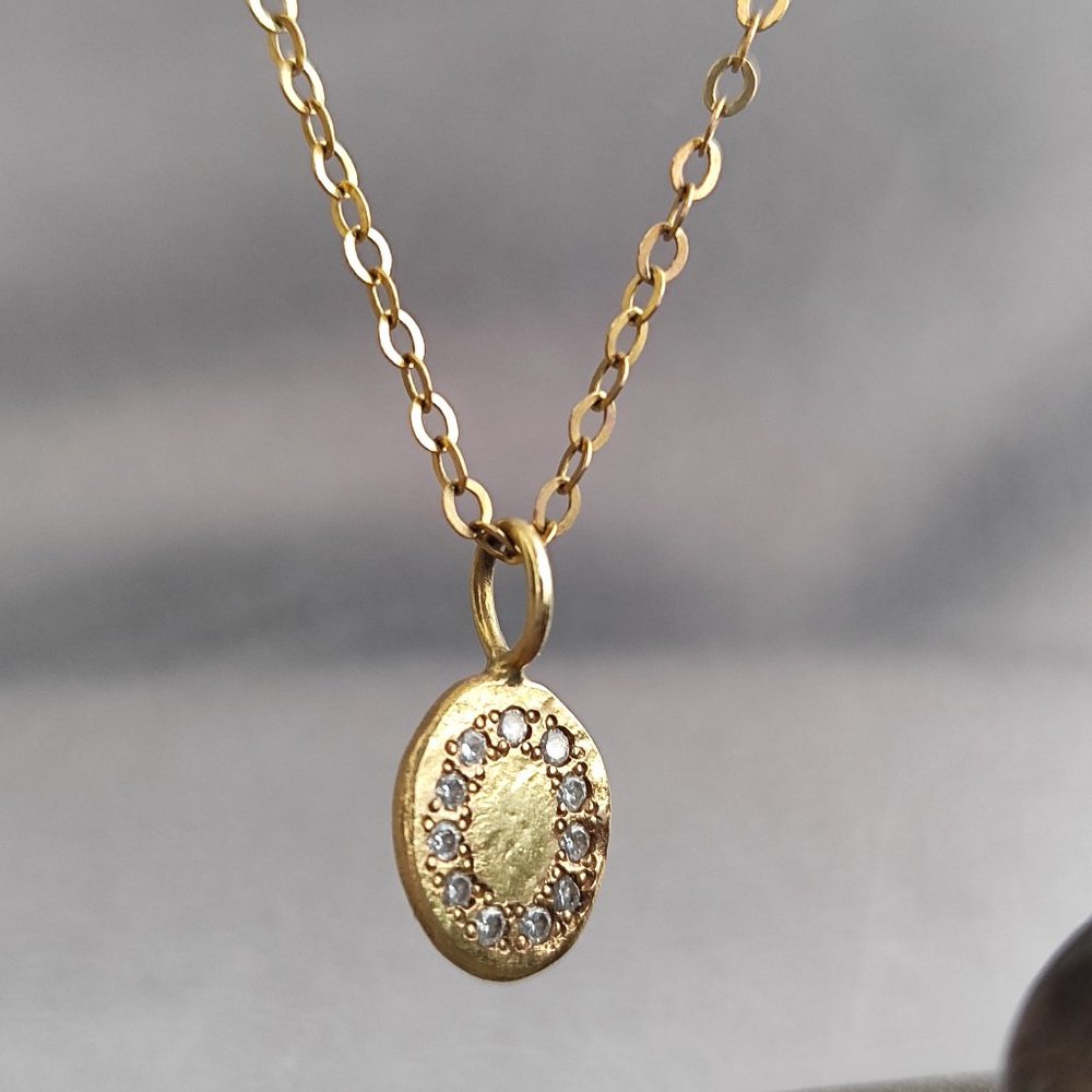 Gold diamond necklace. 14k Yellow gold pendant with 0.11ct diamonds. Very unique